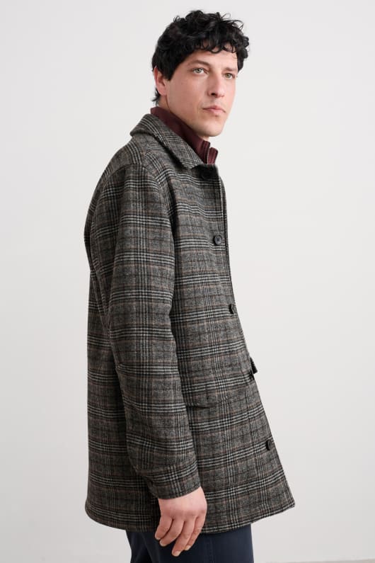 des hommes rowlocks vérifier manteau
