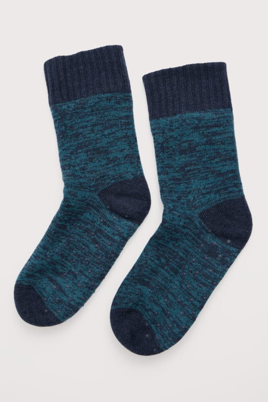 des hommes tricotés maison de chaussettes