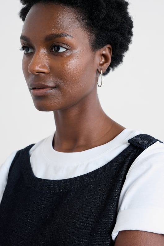 le sel de tissage de longueur de genou pinafore