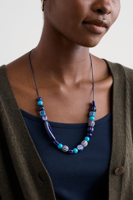 tira en céramique collier de perles